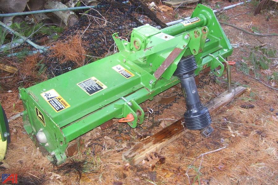 Auctions International Auction Business Liquidation 7672 ITEM John Deere 450 Tiller
