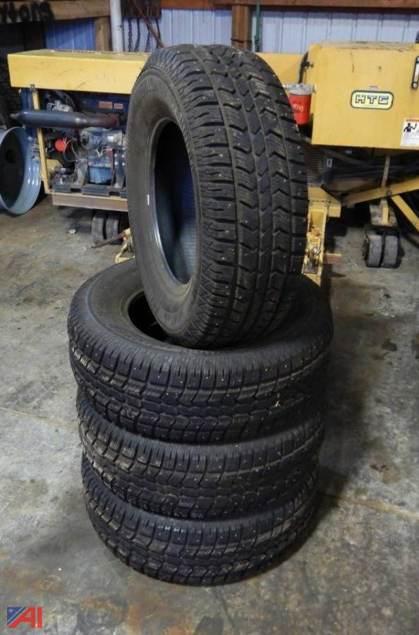 Auctions International Auction Town of Groton HwyNY 31147 ITEM (4) Artic Claw Studded Tires