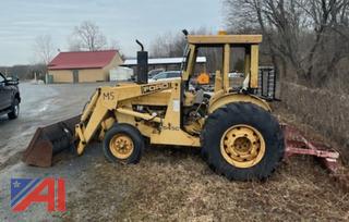 1990-1991 Ford 545C Tractor with Front Loader & York Rake Attachment