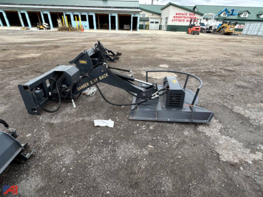 Auctions International Auction Wolverine Import Skid Steer